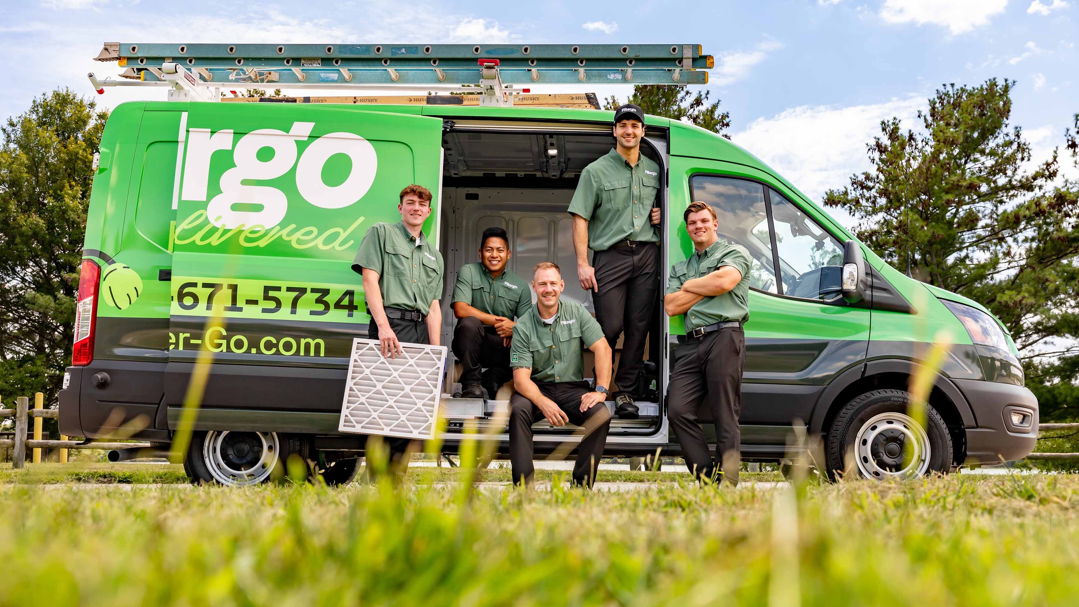 field techs posing for a photo during a advertising photo session with creative olsen